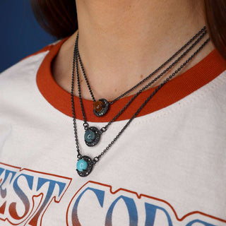 COLLAR CORONA PAVONADO Collares de Joyería Regina Castillo